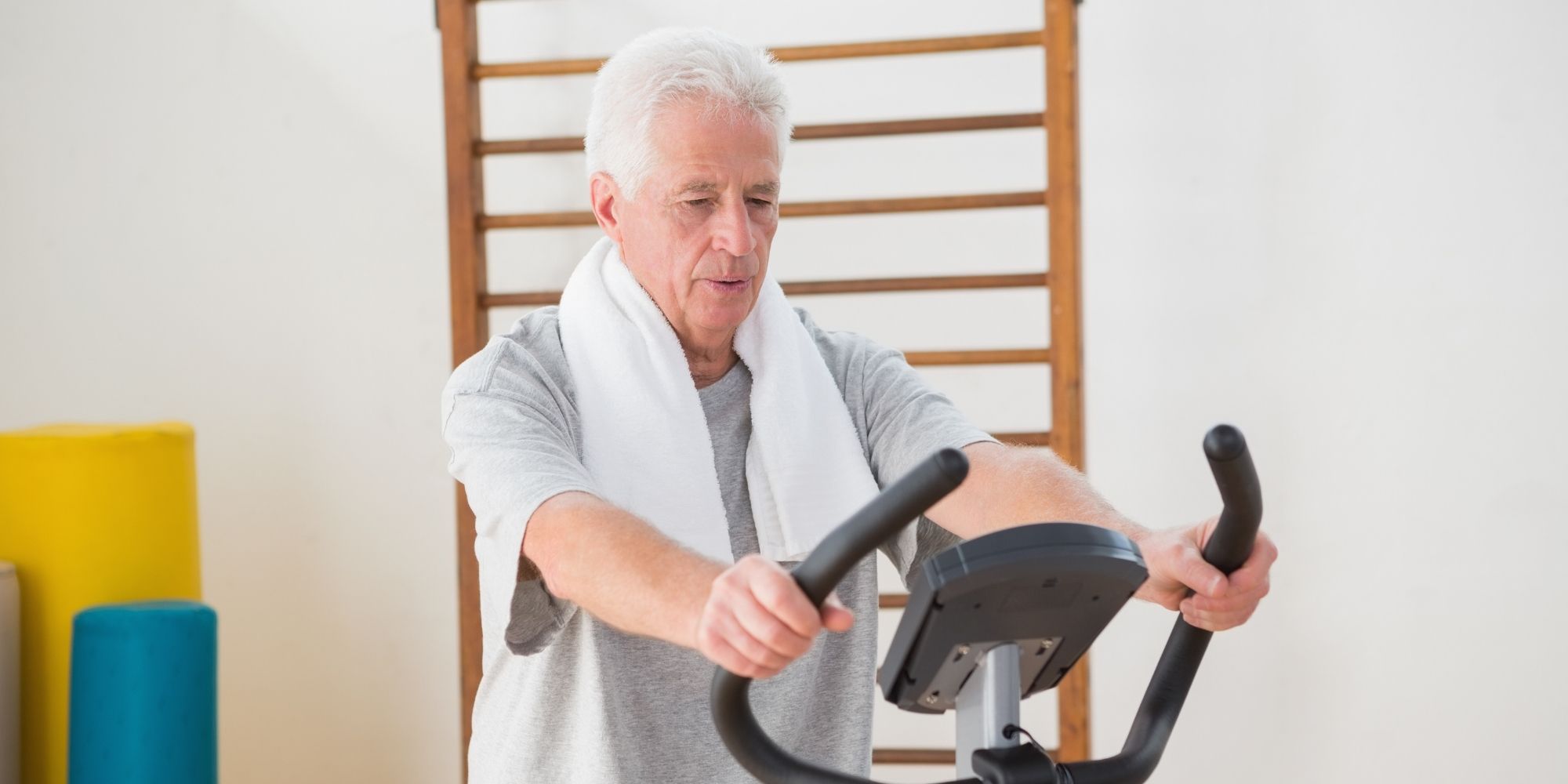 elderly man on exercise bike exercise bikes for seniors