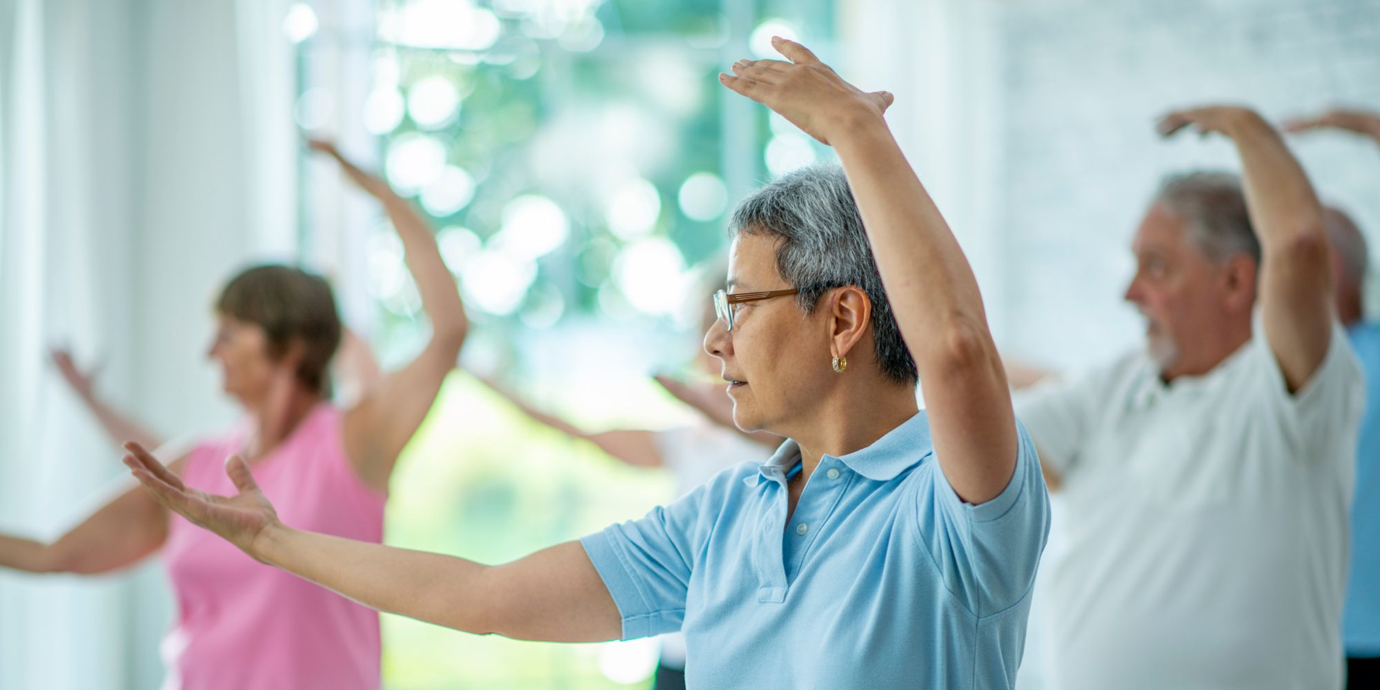 seniors doing tai chi in a class tai chi for seniors