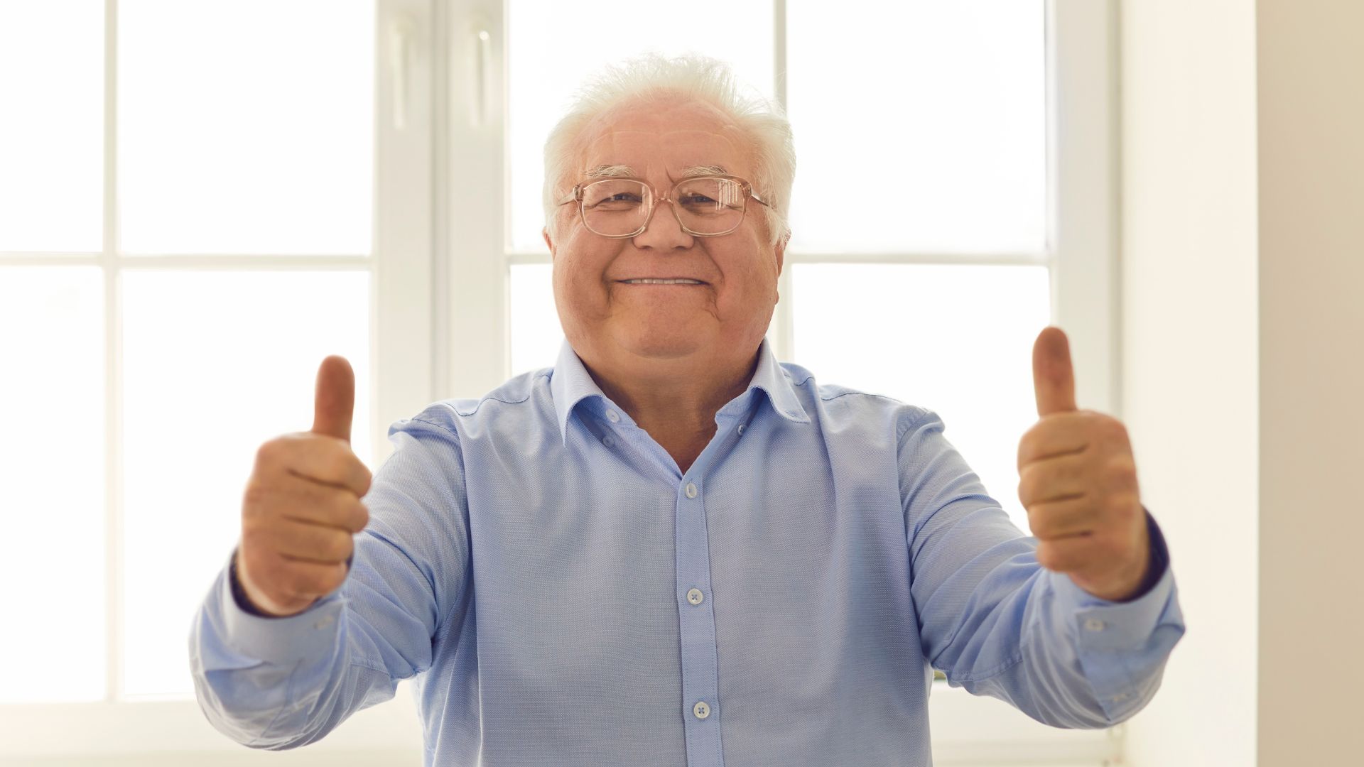 confident older person with thumbs up - how to deal with ageism